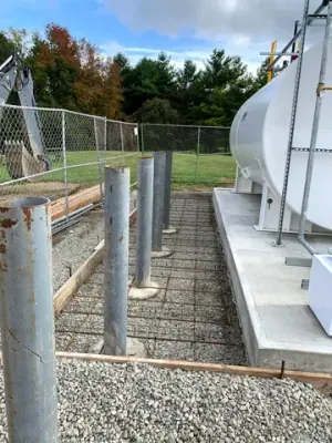 Forms and reinforcement prepared around the tank installation.