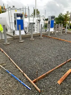 Reinforced concrete bay in front of the dispensing equipment.