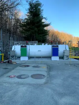 Aboveground tank and dispensing equipment in the fueling area.