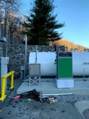 Aboveground tank and dispensing equipment in the fueling area.