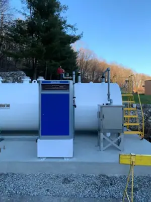 Aboveground tank and dispensing equipment in the fueling area.