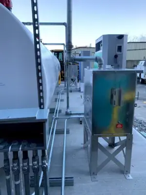 Close views of dispensing equipment and tank-side access hardware.