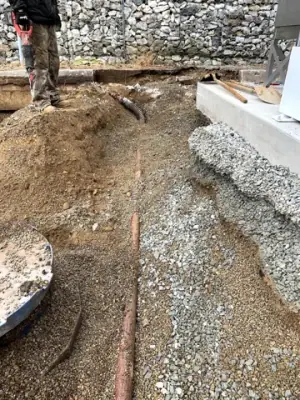 Exposed underground services beside the dispensing equipment.