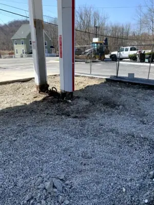 Aggregate preparation around canopy columns and equipment positions.