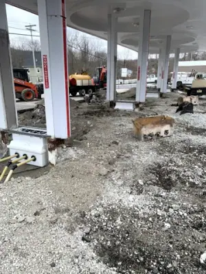 Exposed equipment-base connections beside a canopy column.